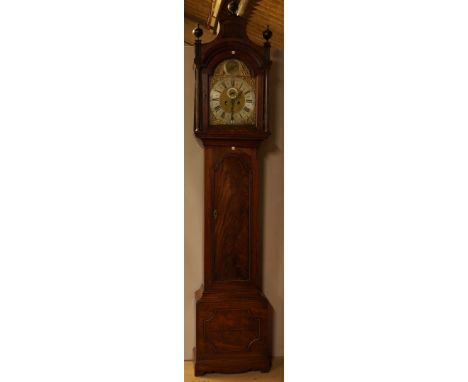 A MAHOGANY LONGCASE CLOCK WITH BRASS DIAL MOVEMENTThe pagoda hood with fluted and stopped columns, with arch panel door below