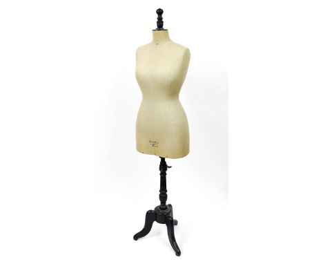 STOCKMAN, PARIS: A FRENCH DRESSMAKER’S MANNEQUIN ON EBONISED PEDESTALEarly 20th Century 
The torso stencilled ‘JUSENIA PARIS’