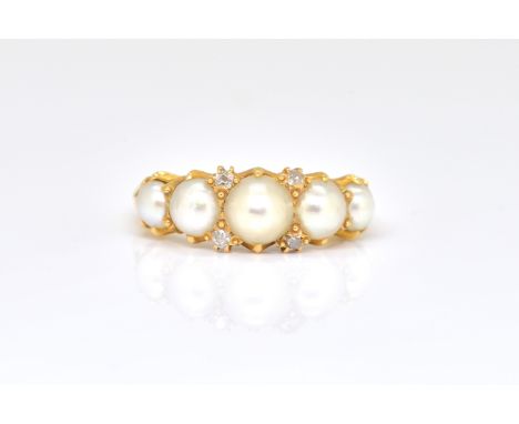 A GOLD, DIAMOND AND CULTURED PEARL HALF HOOP RINGMounted with a row of five graduated half pearls and with two pairs of diamo