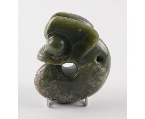 A LARGE CHINESE ARCHAISTIC HONGSHAN STYLE JADE ZHULONG ( PIG DRAGON)Of spinach green tone with cream and light brown inclusio