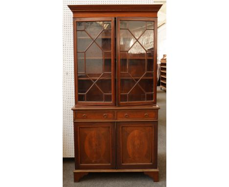 T WILSON; A 19TH CENTURY SATINWOOD BANDED MAHOGANY DISPLAY CABINET CUPBOARD114cm wide; 47cm deep; 218cm highCondition report: