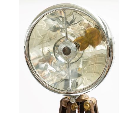 A CHROME LUCAS BI-FLEX LONG RANGE LAMP MOUNTED AS A FLOOR STANDING LIGHTMid-20th Century 
Later mounted on a mid-20th Century
