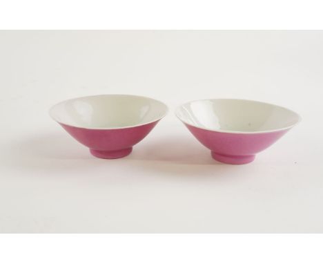 A PAIR OF CHINESE PINK GROUND BOWLS (2)Yongzheng blue enamel four character mark but later
Each exterior with a deep pink gro