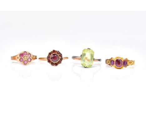 FOUR GEM SET RINGS (4)Comprising; a gold and garnet cluster ring, detailed 9 CT, ring size N, a gold, garnet and seed pearl c