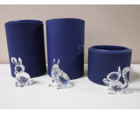 Three boxed Swarovski Crystal animals - hare, rabbit and a squirrel 