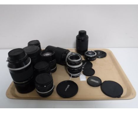 Ten Nikon camera lenses - Nikon Nikkor ED 180mm 428925, Nikon Nikkor 20mm 239410, Nikon Nikkor 135mm 953262, Nikon Nikkor C A