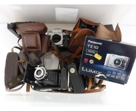 A Zeiss Ikon folding camera Novar Anastigmat 105mm together with other vintage cameras by Iflord, Coronet, Nikomat, Contessa 