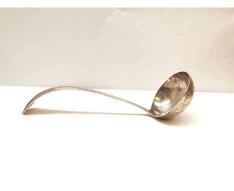An early 20th century Dutch silver soup ladle by JAA Gerritsen with beaded design to the edge. Hallmarked: Amsterdam, Zeist, 