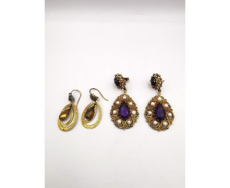 Two pairs of antique yellow metal earrings, one pair of yellow metal (tests as 9ct) fern design drop earrings set with amethy