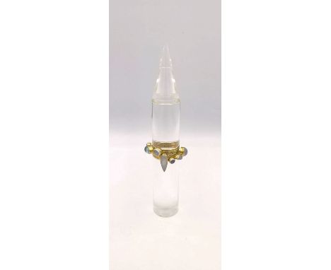 Wendy Ramshaw C.B.E. R.D.I. (British 1939-2018), seven part stacking ring set, 1988, 18ct yellow gold, rainbow moonstone, aqu