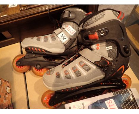 Pair of in line roller skates size 9