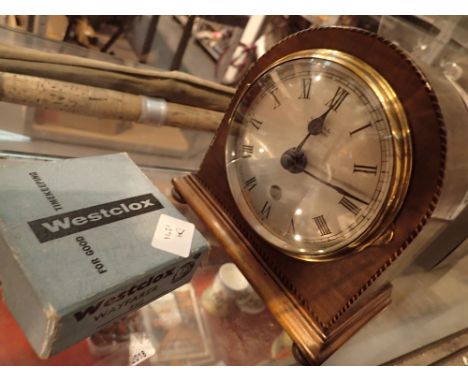 Vintage mantel clock and a retro alarm clock