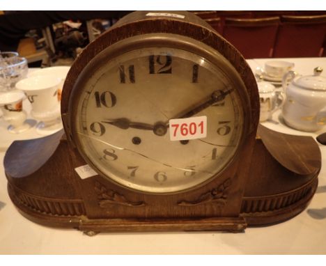Large oak cased shaped mantle clock with carved decoration with pendulum and key 