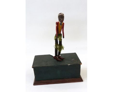 Perry & Co painted wooden automaton 'Negro' dancer with painted wooden base containing movement and key 