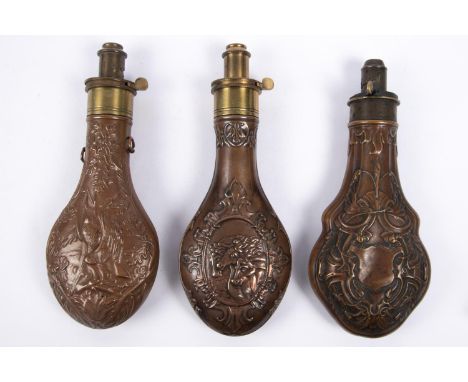 An embossed copper gun size powder flask "Panel" (R550, no rings), basically GC (dented); and two good quality reproduction p