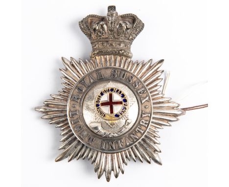 An officer's 1861 pattern shako badge of the Royal Sussex Light Infantry Militia, with enamelled centre. GC £250-350 