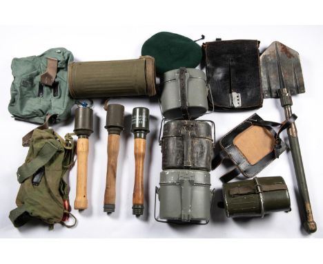 Post WWII German equipment: 3 mess tins, 2 bags, respirator canister and cover, entrenching tool and cover, officers map case