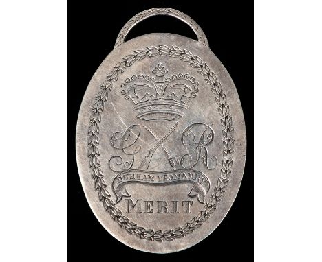 Durham Yeomanry oval medal for Merit 1807, obverse engraved crown above crossed carbine and sword, between "G" and "R", above