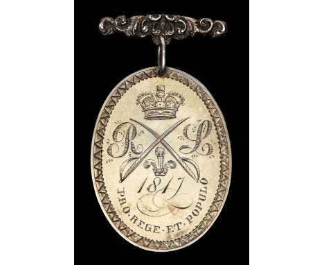 Rutland Legion: oval silver engraved regimental medal 1817, obverse: crown over crossed swords with "R" and "L" on either sid