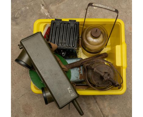 A US WWII signal corps transmitter RC611, a German field coffee grinder in its case, a WWII or earlier German hurricane lamp,