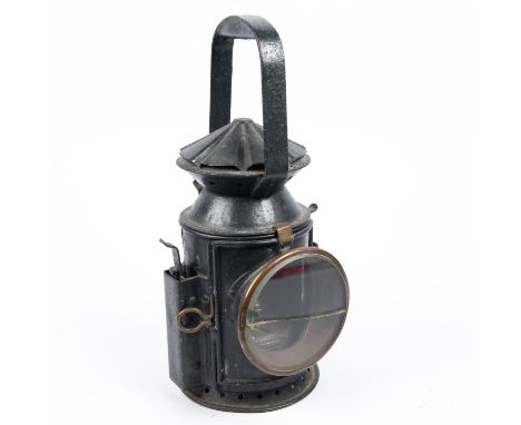 A WWII military railway oil lamp, marked "WAKEFIELD BIRMINGHAM 1945", also a broad arrow, complete with burner. GC (glass len