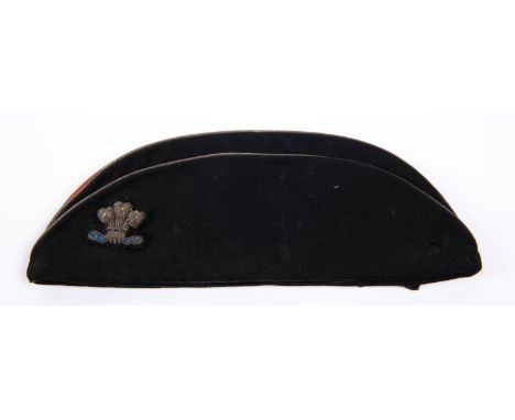 An early 20th century officer’s tent cap of the 10th Hussars, with bullion Prince of Wales’ feather badge and maker’s name “H