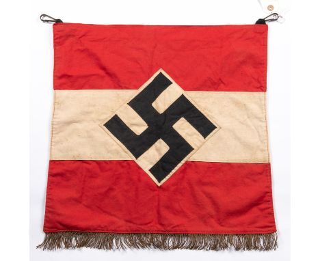 A Third Reich Hitler Youth trumpet banner, with applied device, 2 metal suspension clips, and fringe along the bottom edge. G