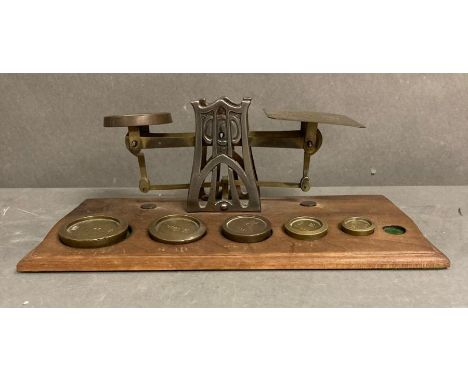 A set of vintage brass postal scales AF