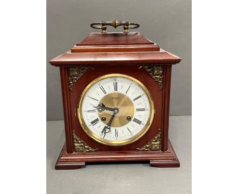 A mantel clock with Westminster chime (25cm x 28cm)