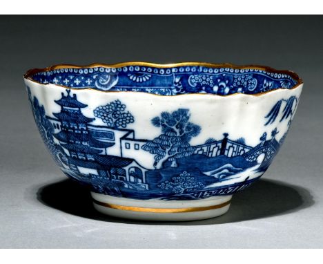 A Caughley slop basin, c1790, transfer printed in underglaze blue with the Pagoda pattern and gilt, 14.5cm diam, S mark  Prov