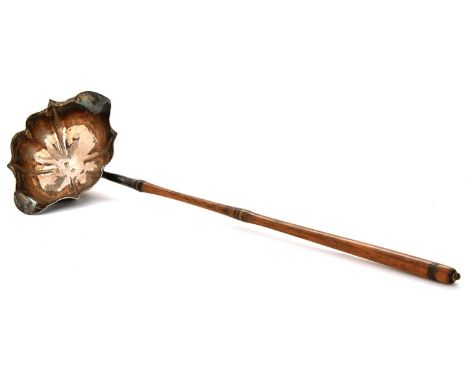 A George&nbsp;III double lipped silver punch ladle,&nbsp;&nbsp;the bowl on slender turned wood handle, 31cm l, by Charles Cla