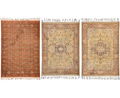 Three Persian style rugs, 20th c, 119 x 170cm, 120 x 168cm and 120 x 188cm    Good condition, possibly requiring a light clea