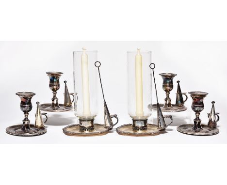 A pair of Old Sheffield Plate chambersticks, The M Boulton Plate Co, c1810, and a set of four earlier oval examples, extingui