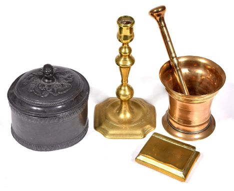 A George III brass/bell metal pestle and mortar, late 18th century, mortar 86mm high, a mid 18th century English brass candle