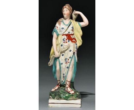 A Staffordshire pearlware figure of Diana, c1820, painted in overglaze enamel colours, on square base, 29cm h    Slight damag