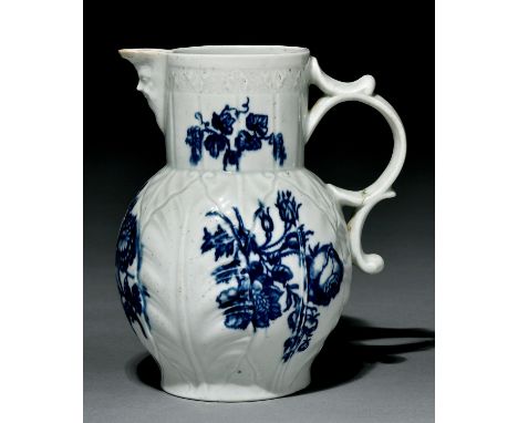 A Worcester cabbage leaf-moulded mask jug, c1770, transfer printed in underglaze blue with the Natural Sprays Group pattern, 