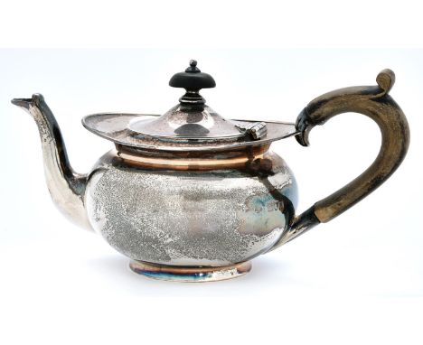 An Edwardian silver bachelor's teapot, 10cm h, by Horace Woodward &amp; Co Limited, London 1907, 8ozs 10dwts  Provenance: Hea
