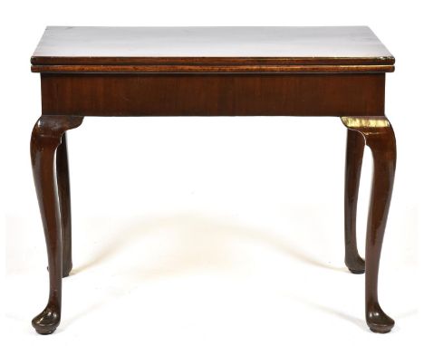 A George III concertina-action mahogany card table, mid 18th c, the top with counter wells on cabriole legs and pad feet, 71c