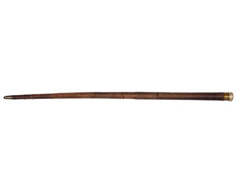 A leather bound gadget cane, incorporating a two drawer brass one inch telescope and compass, plated bun pommel, brass and st