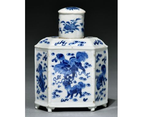 An hexagonal Chinese blue and white tea caddy and cover,&nbsp;painted with dogs of Fo and flowers, 19cm h, Guangxu mark    Mi