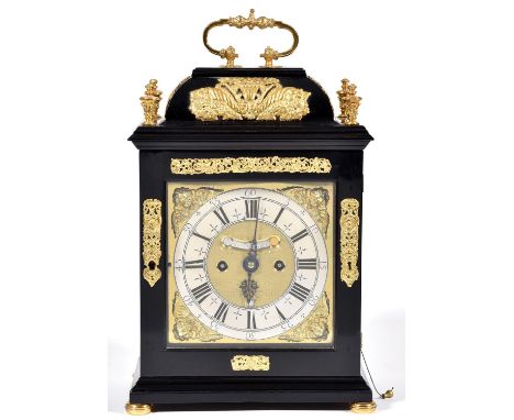 An English basket top ebony clock, Henry Massy London, c1700, the brass dial with matted centre, date aperture, signature and