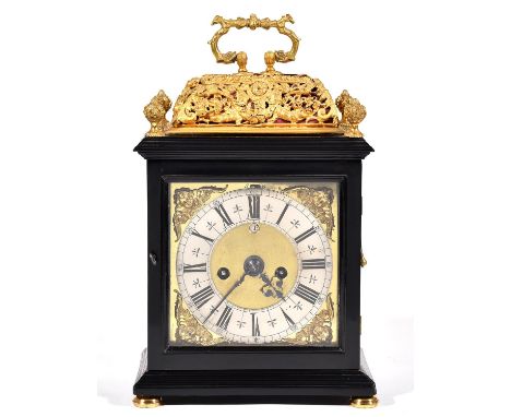An English basket top ebony clock, Nicholas Massy, dated 1686, the 17cm brass dial with matted centre, date aperture, plain w