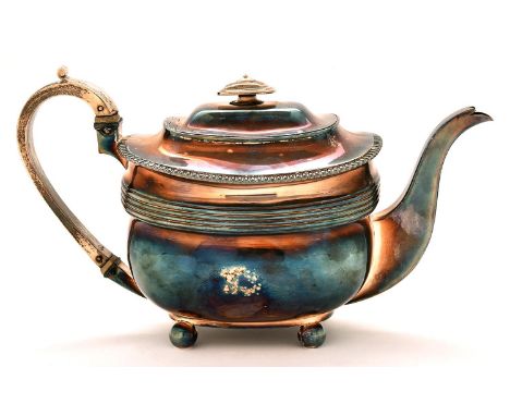 A George III silver teapot, of gadrooned oblong shape on ball feet, 16cm h, by Rebecca Emes and Edward Barnard, London 1809, 