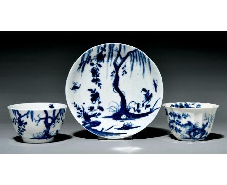 A rare Worcester tea bowl and saucer and a fluted tea bowl, c1755, the tea bowl and saucer painted in underglaze blue with th