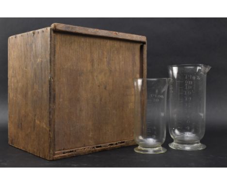 Vintage Advertising - two vintage 20th-century etched glass pharmacy chemists' apothecary measuring beakers to include a pint