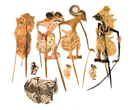 A collection of seven Javanese Wayang Kulit shadow puppets. The lot to include four large ones, each made from perforated and
