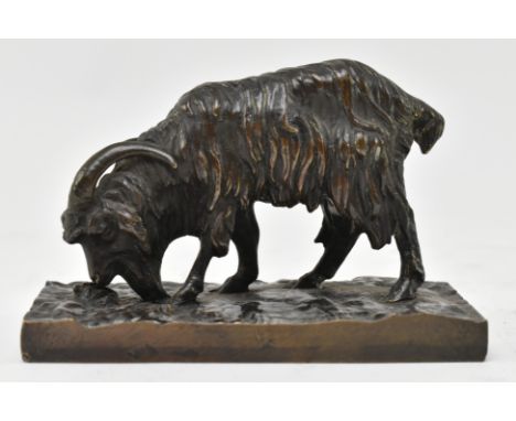Antoine Louis Barye - A 19th century French bronze paperweight figure of a mountain goat. The goat figured eating grass being