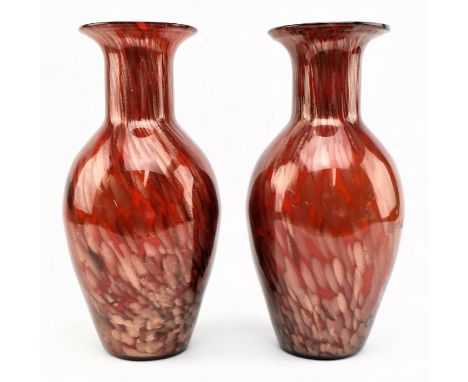 A pair of 20th century Murano style baluster cased glass centrepiece vases. Each vase having a flared mouth rim decorated wit