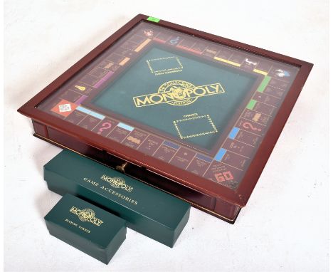 Franklin Mint - Collector's Limited Edition Monopoly games board. The board cased in glazed mahogany frame, complete with sep