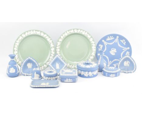 A collection of fourteen pieces of Wedgwood blue and green Jasperware. The blue Jasper ware to include two vases, two circula